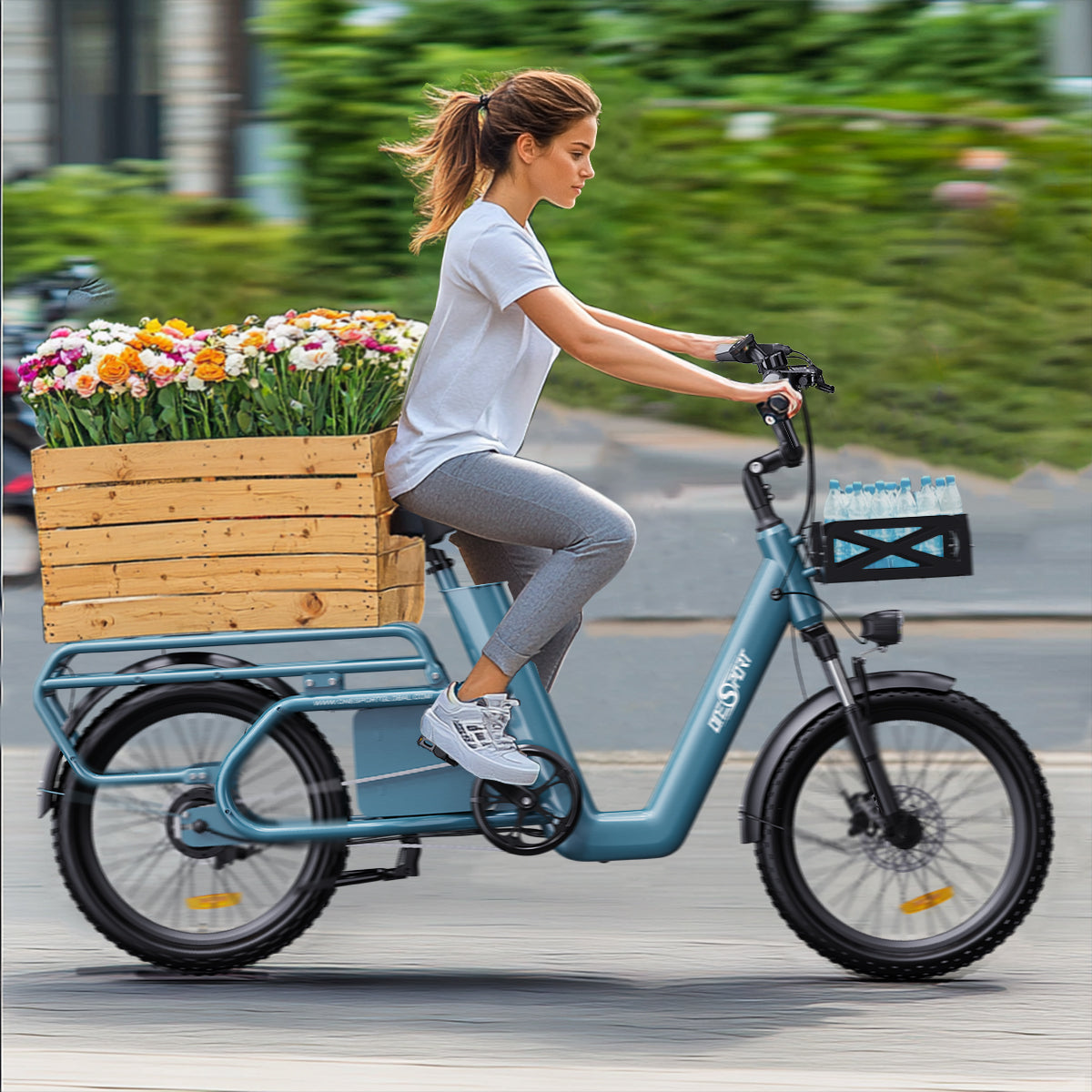 A girl is riding Onesport OT 01 cargo e-bike to carry flowers in a wooden box on the city road.